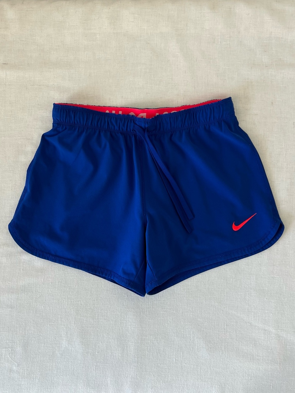Nike Women’s Royal Blue Running Shorts with Pink Swoosh and Inner Lining